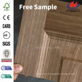 JHK-M03 Grano de madera y textura elevada Nogal MDF ISO9001 Puerta de entrada de piel